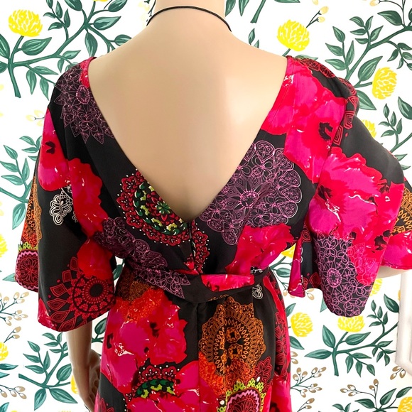 Floral hi-low Romper with tie belt and skirt. - Picture 5 of 12